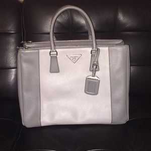 Gray Prada Saffiano Lux double zip tote handbag.